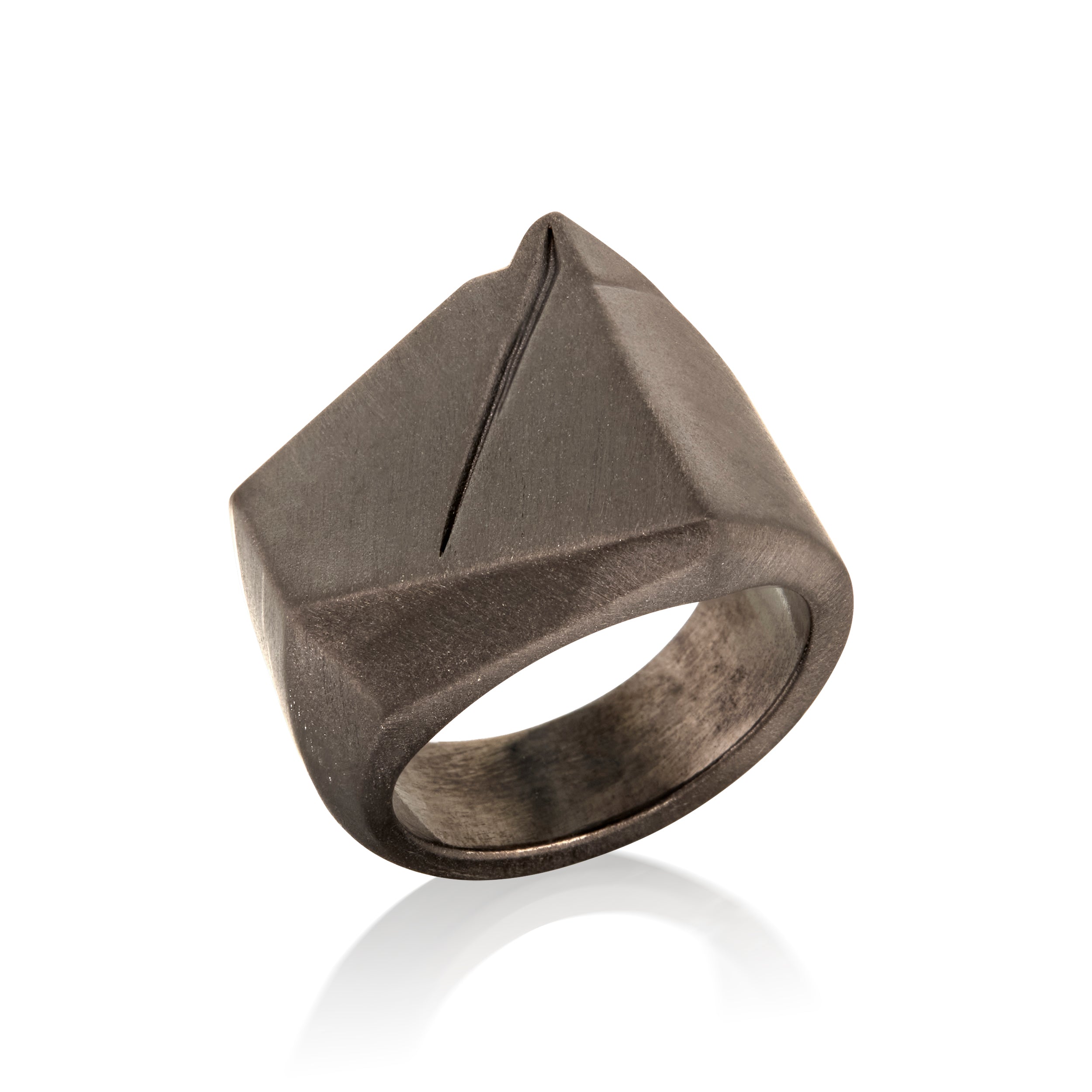 Bronze ring in 14k Gold with geometric design on a white background