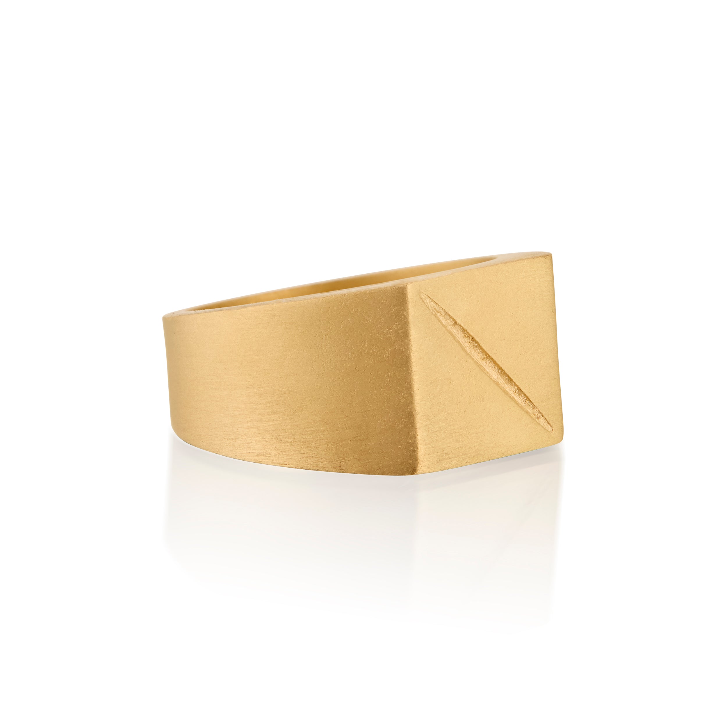 Gold ring 14k with a square face and an etched scar on a white background