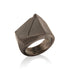 Bronze ring in 14k Gold with geometric design on a white background