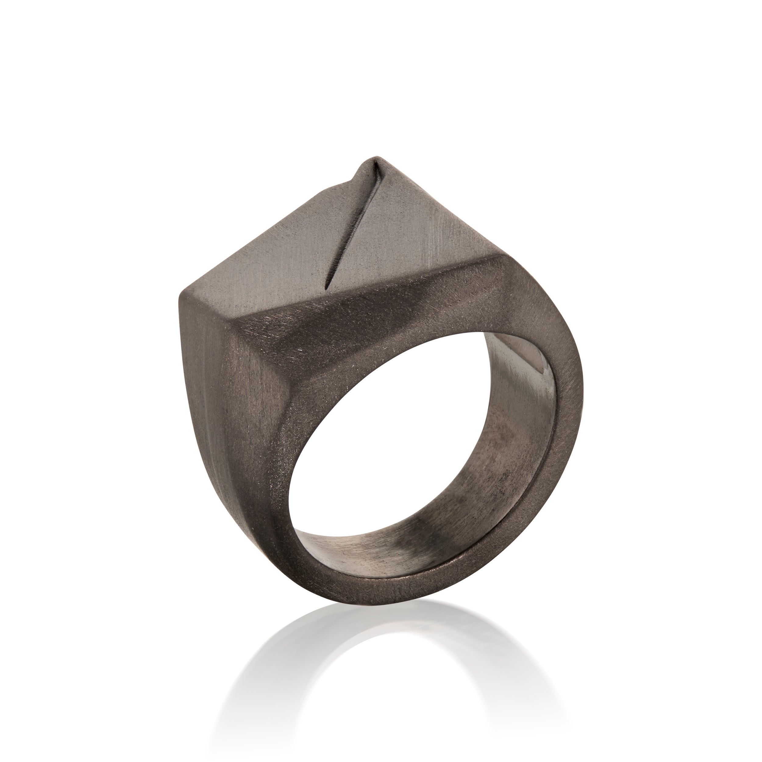 Black geometric ring in 14k Gold ring on a white background