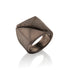 Bronze ring in 14k Gold with geometric design on a white background